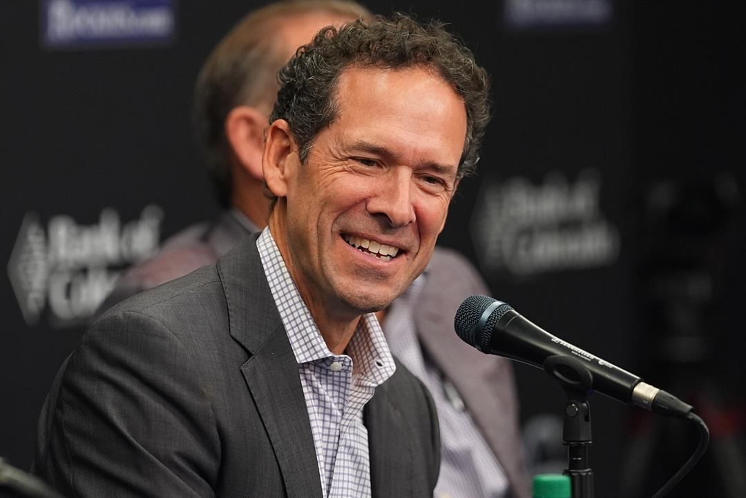 Colorado Rockies new president of baseball operations Paul DePodesta jokes with reporters during a news conference introducing him, Thursday, Nov. 13, 2025, in Denver.