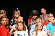 Sidney third graders honor veterans with concert and visit from local veteran
