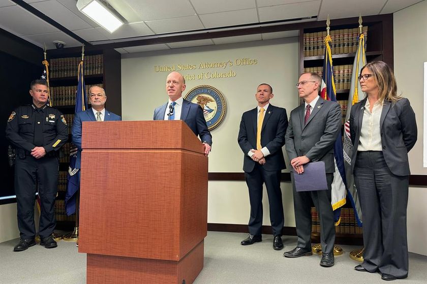 U.S. Attorney for the District of Colorado Peter McNeilly, joined by local and federal officials, announces the indictment of several people accused of working with a Mexican drug trafficking organization, Wednesday, Nov. 19, 2025, in Denver.