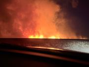 Grass fire near I-76 in Sedgwick County contained; semi driver charged