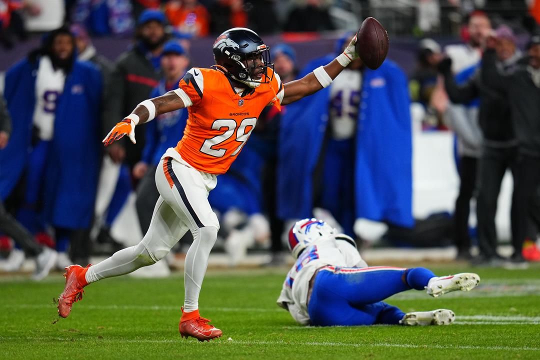 Broncos advance to AFC title game, beating Bills 33-30 after McMillian's INT in overtime