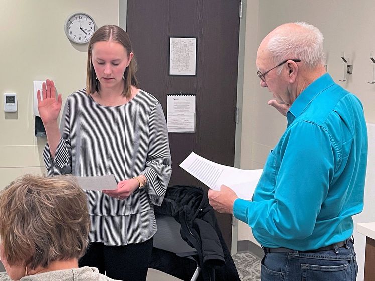 Board Chair Jim Cederburg swore in Taryn Reader as the newest member of the Kimball Health Services Board of Trustees Monday.